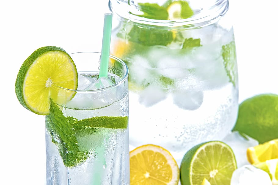 citrus flavored water, mineral water, lime, ice, mint, glass, drink, cold, white background, lemon mineral
