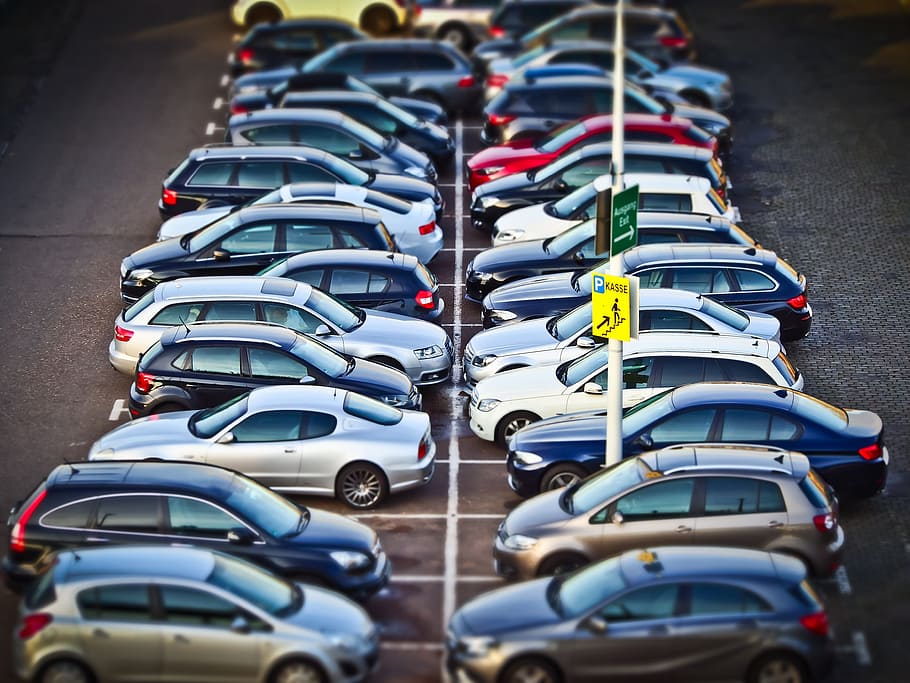 assorted-color car lot, autos, parking, park, traffic, vehicles, city, tilt shift, miniature effect, street photography