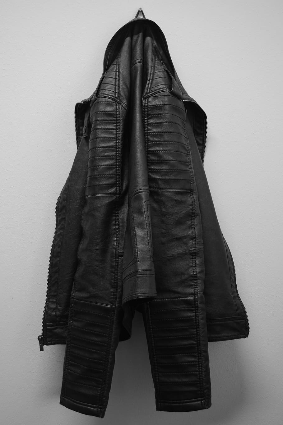 black, leather jacket, hanging, white, wall, jacket, leather coat, clothing, coat hanger, black white