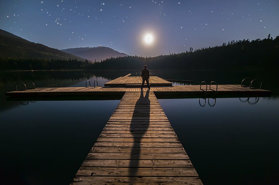 man, standing, dock, night time, alone, astronomy, blue, british columbia, canada, deck