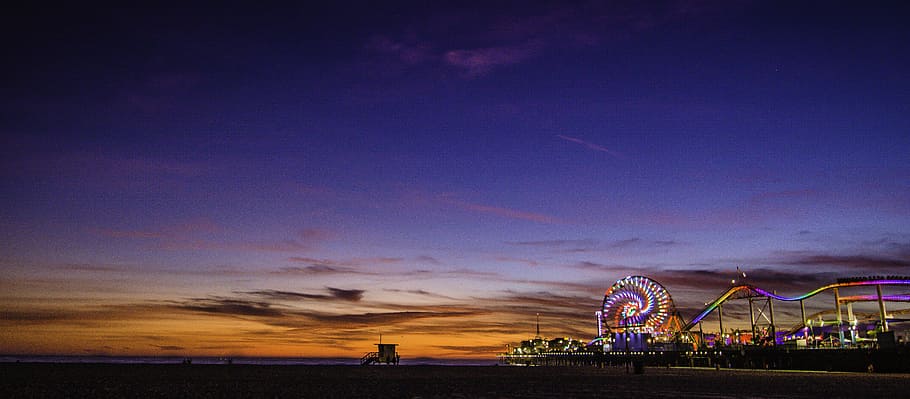 Santa Monica Pier, amusement park at nighttime, sky, amusement park, amusement park ride, arts culture and entertainment, ferris wheel, beach, nature, sunset
