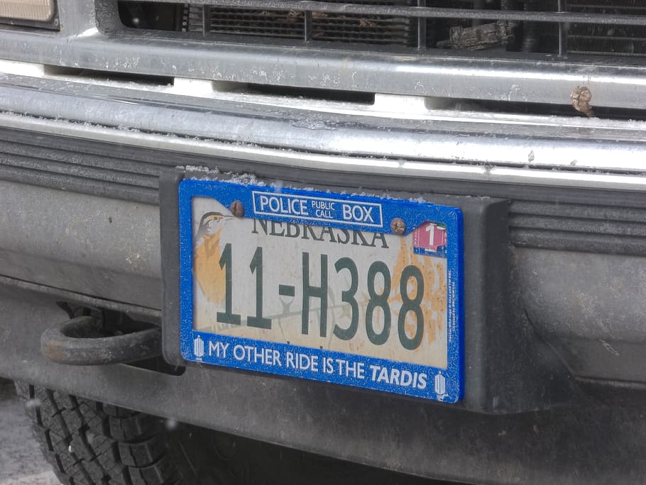 license plate, doctor who, nebraska, text, communication, western script, metal, sign, blue, transportation