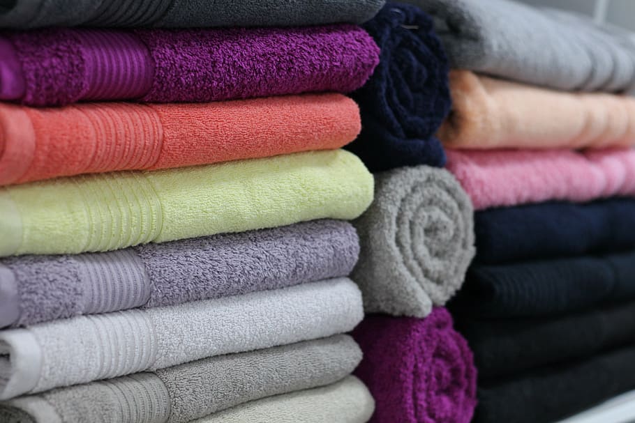 assorted-color towel lot, towels, linens, store, bath linen, white, travel, for sale, bath, buy