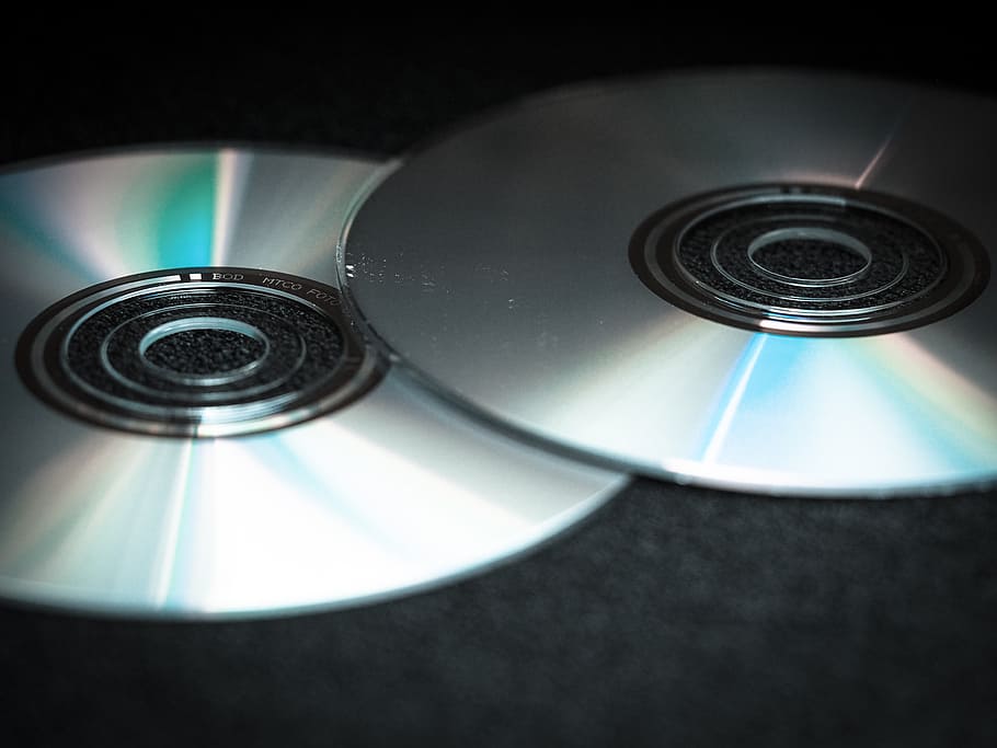 two gray discs, dvd, cd, blank, computer, digital, silver, disk, data, glassy