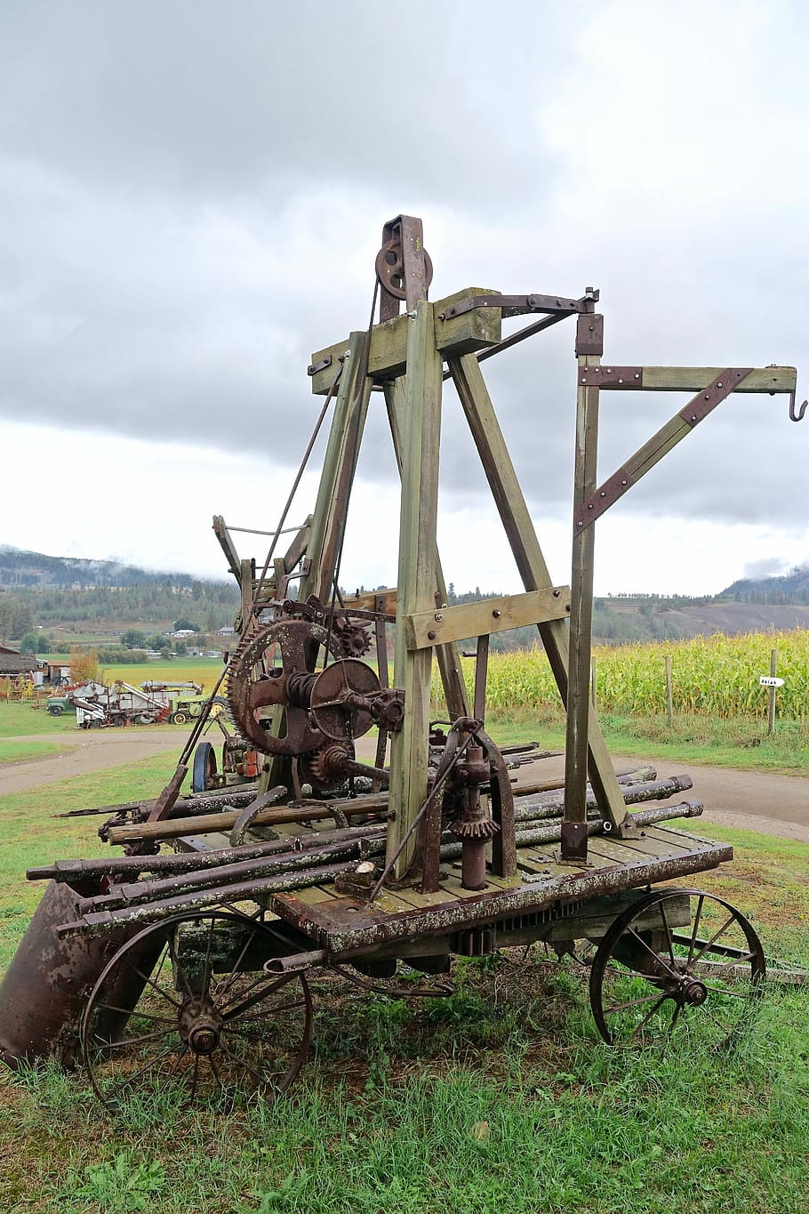 Machine, Agriculture, Pulley, farming, machinery, vintage, historical, wooden, cloud - sky, field