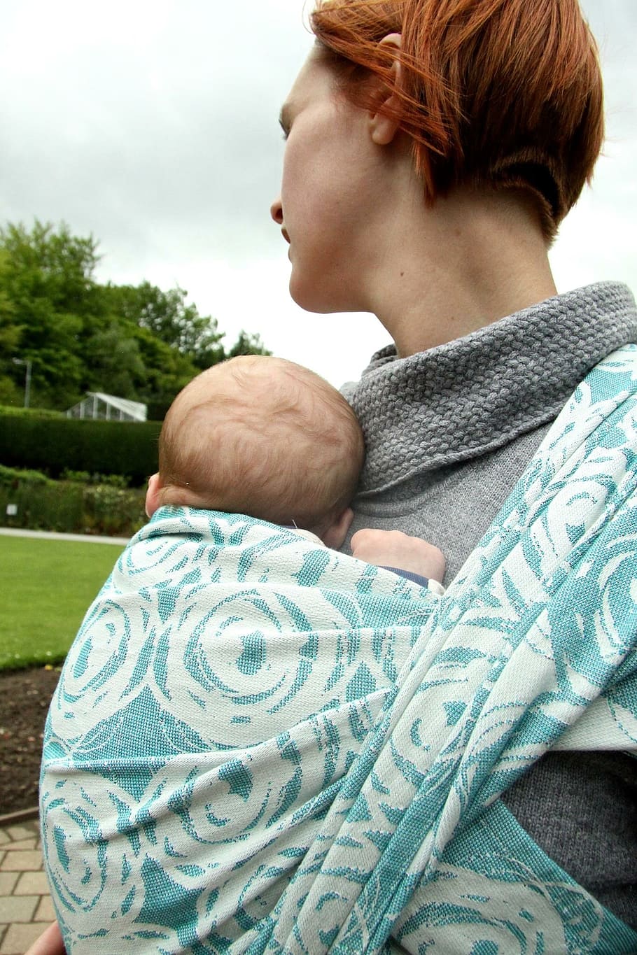 woman, carrying, baby, newborn, woven wrap, babywearing, sling, real people, one person, lifestyles