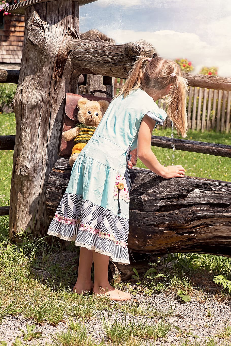 toddler girl, standing, brown, bear, plush, toy, leaning, bag, daytime, person