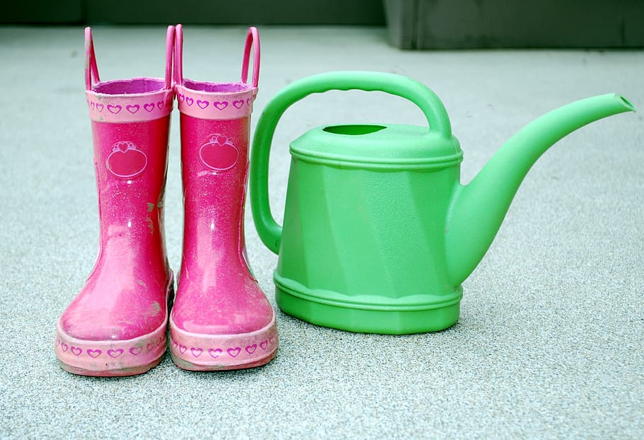 pair, pink, rainboots, green, pitcher, boots, child, close up, dirty, gardening