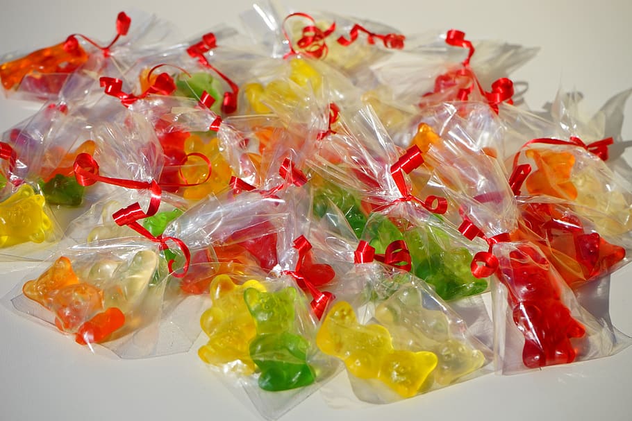 gummi bears, packed, sachets, mitbringsel, cellophane, gummi bear, bear, sweetness, colorful, color