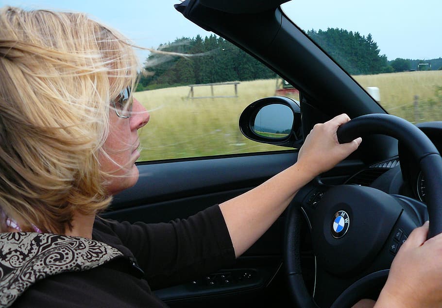 woman, black, shirt, driving, bmw car, green, fields, person, convertible, cabriolet