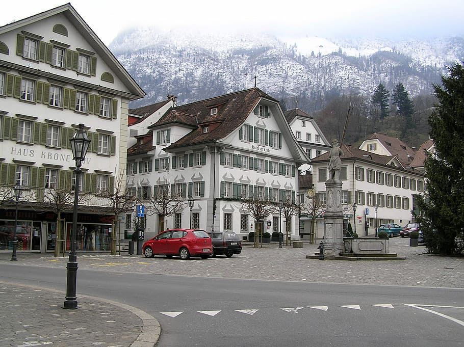 village square, village, square, Stans, Switzerland, buildings, photos, houses, mountains, public domain
