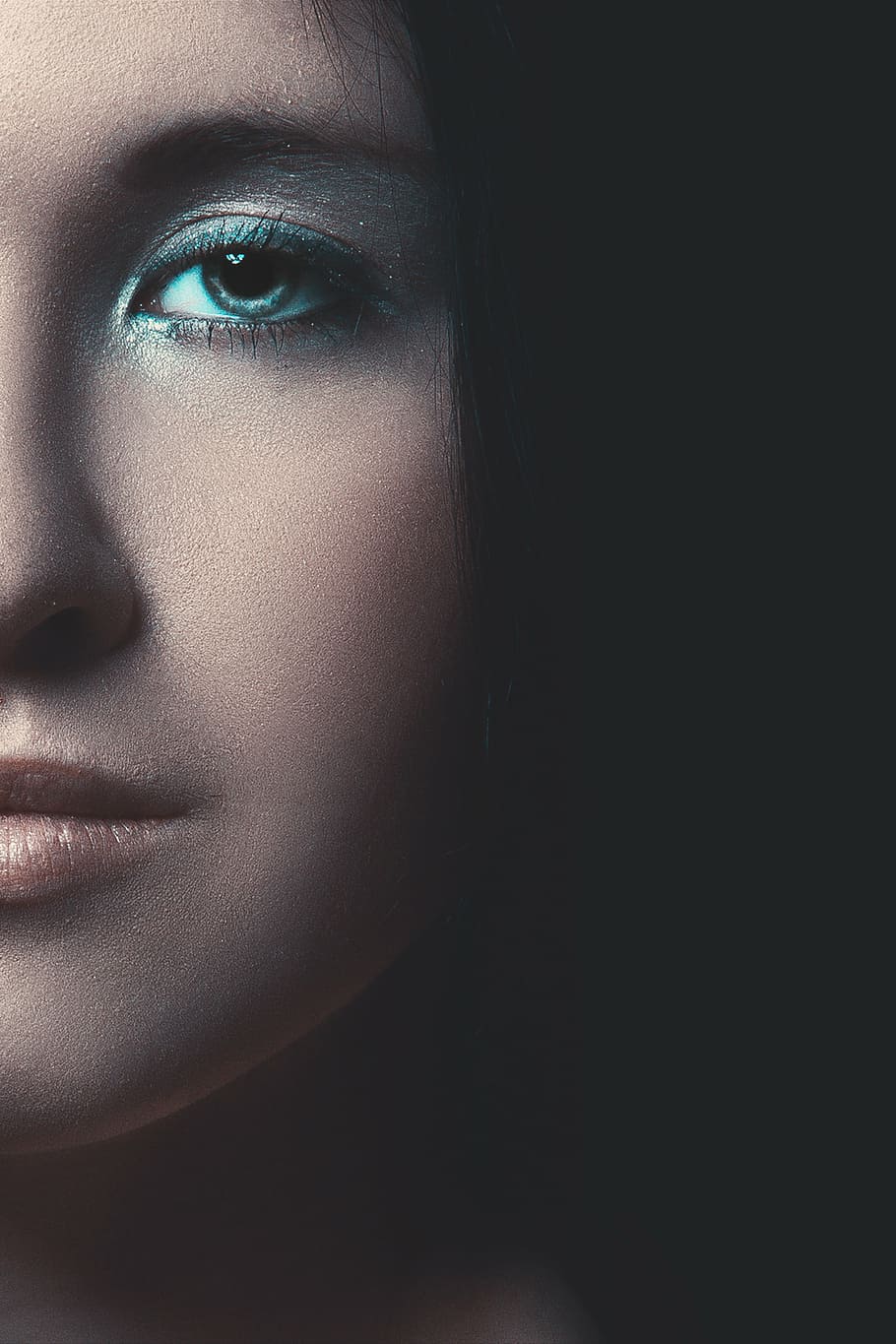 close, woman, left, side face painting, mystical portrait of a girl, eyes, black background, girl, hair, makeup