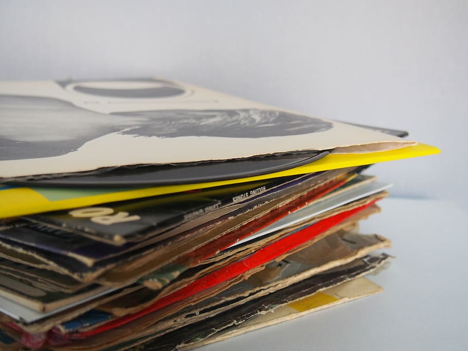 pile, record sleeves, assorted, printed, papers, wooden, top, records, vinyls, albums
