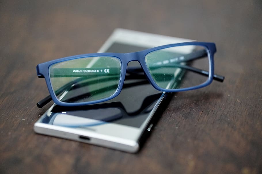 glasses, phone, reading glasses, cool glasses, blue glasses, tech, mobile phone, table, eyeglasses, wood - material