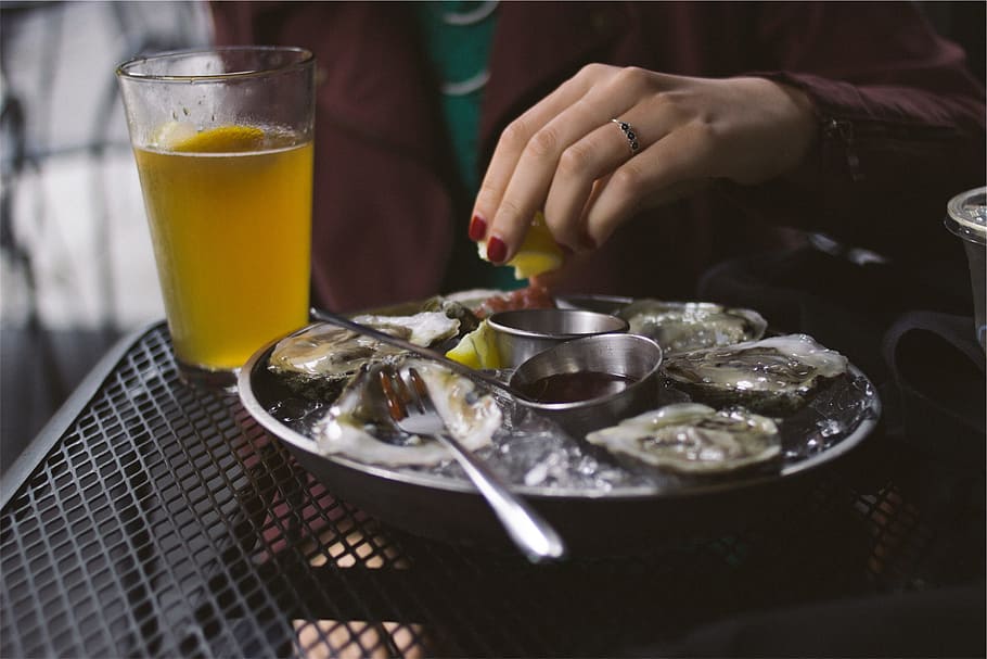 oysters, seafood, lemon, glass, beer, ice, shells, squeeze, hands, food and drink