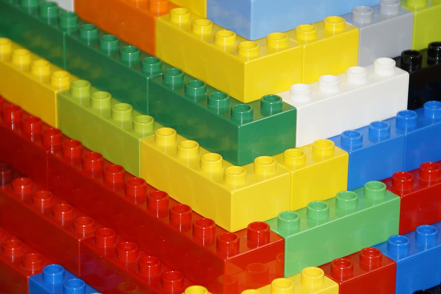 assorted-color lego toys, lego, lego duplo, building, built, build, building blocks, children, toys, child