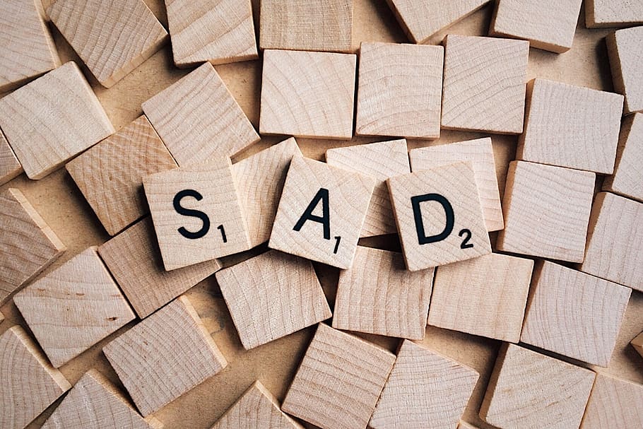 brown, sad, scramble piece, emotion, word, letters, wooden, large group of objects, wood - material, indoors
