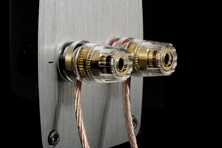 closeup, cylindrical, gold-colored part, gray, board, speakers, connection, speaker cable, cable, audio