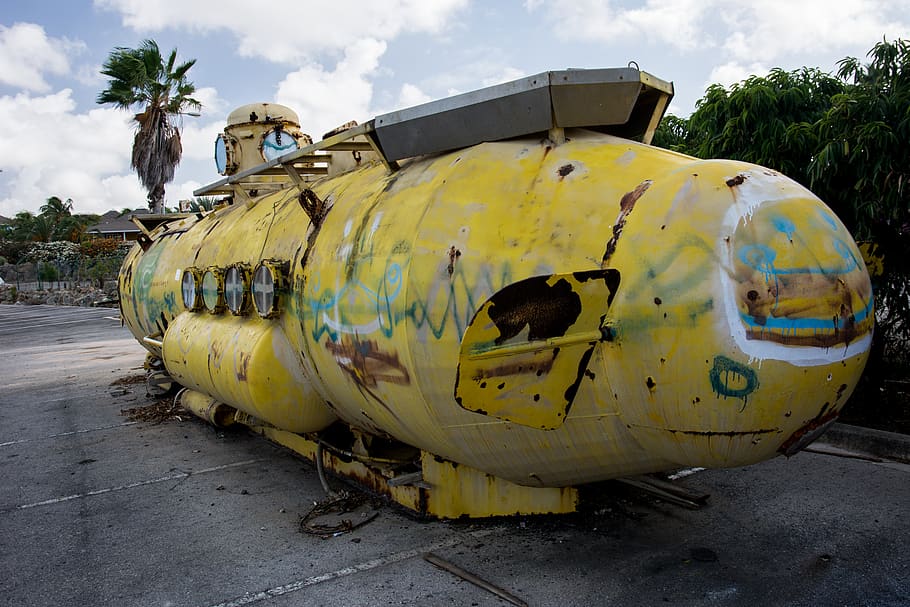submarine, yellow, old, vintage, graffiti, spray paint, sky, mode of transportation, tree, transportation