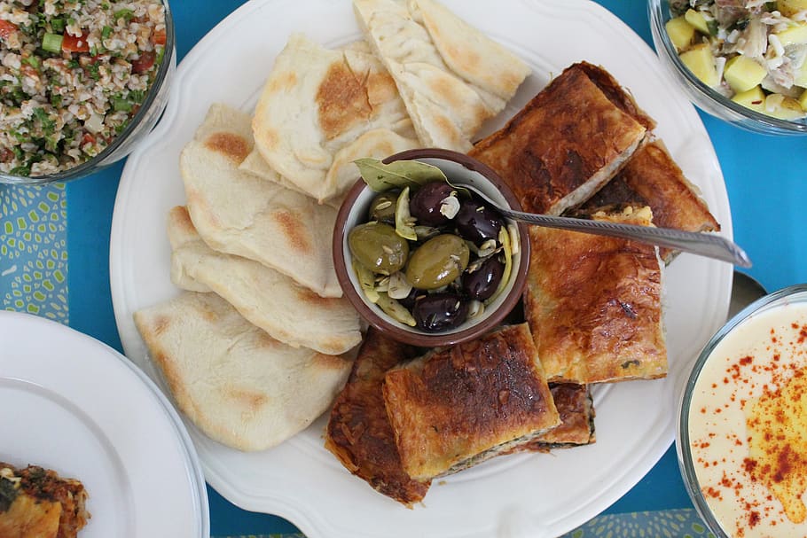 pita, burek, mezze platter, marinated olives, middle eastern food, mediterranean food, food, plate, food and drink, ready-to-eat