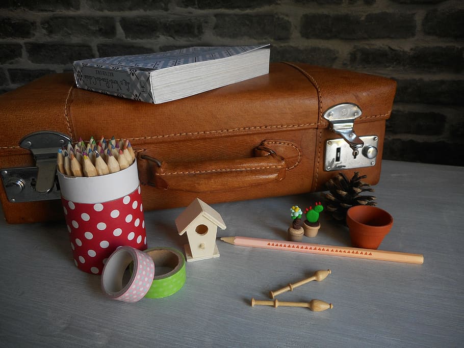 blue, book, brown, luggage bag, pencil pot, colored pencil, pencil box, box, suitcase, brown suitcase