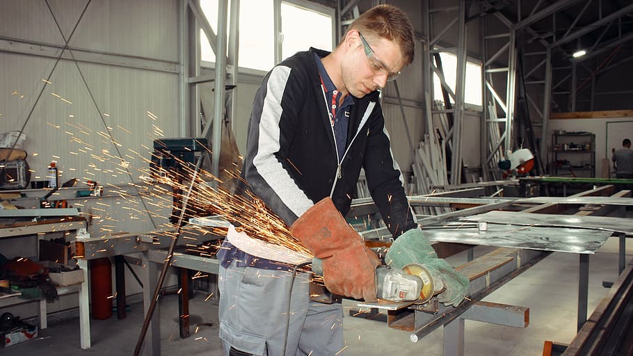 man welding metal frame, daytime, master, worker, grinder, tool, tools, work, man, construction