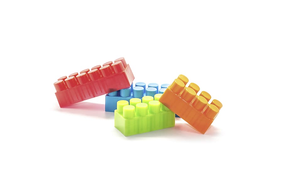 four, assorted-color, interlocking, brick toys, white, background, bricks, play, objects, plastic