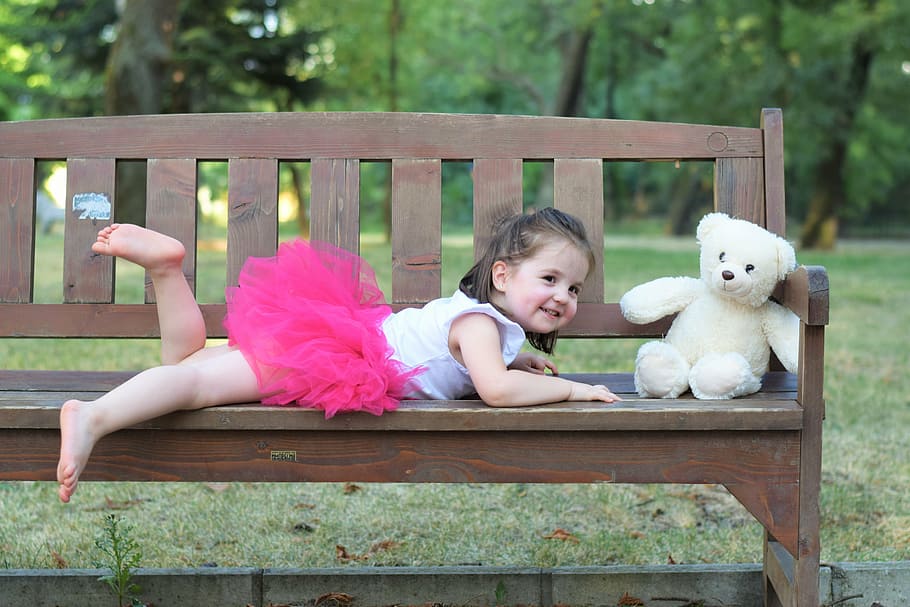 baby, wears, pink, tutu skirt, white, bear, brown, wooden, bench, kid