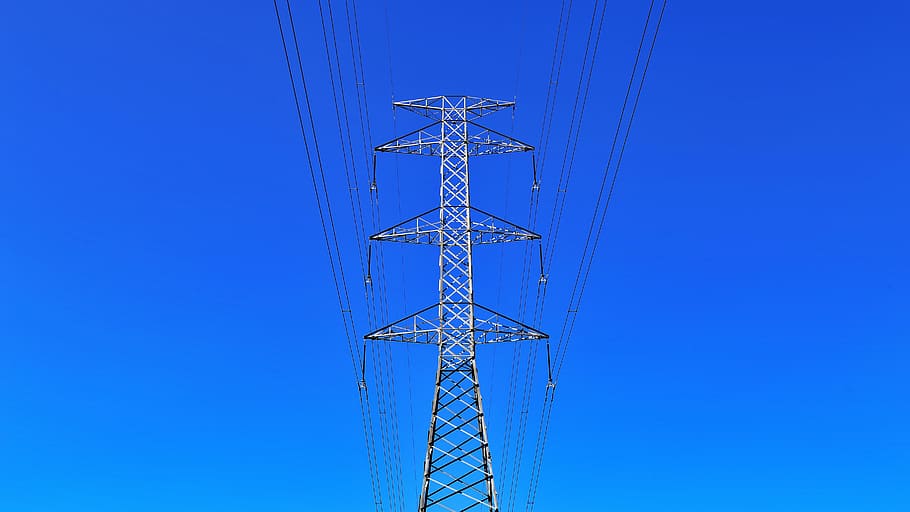 low-angle photography, transmission tower, power lines, power pole, steel structure, electrical transmission lines, powerline, blue, sky, electricity