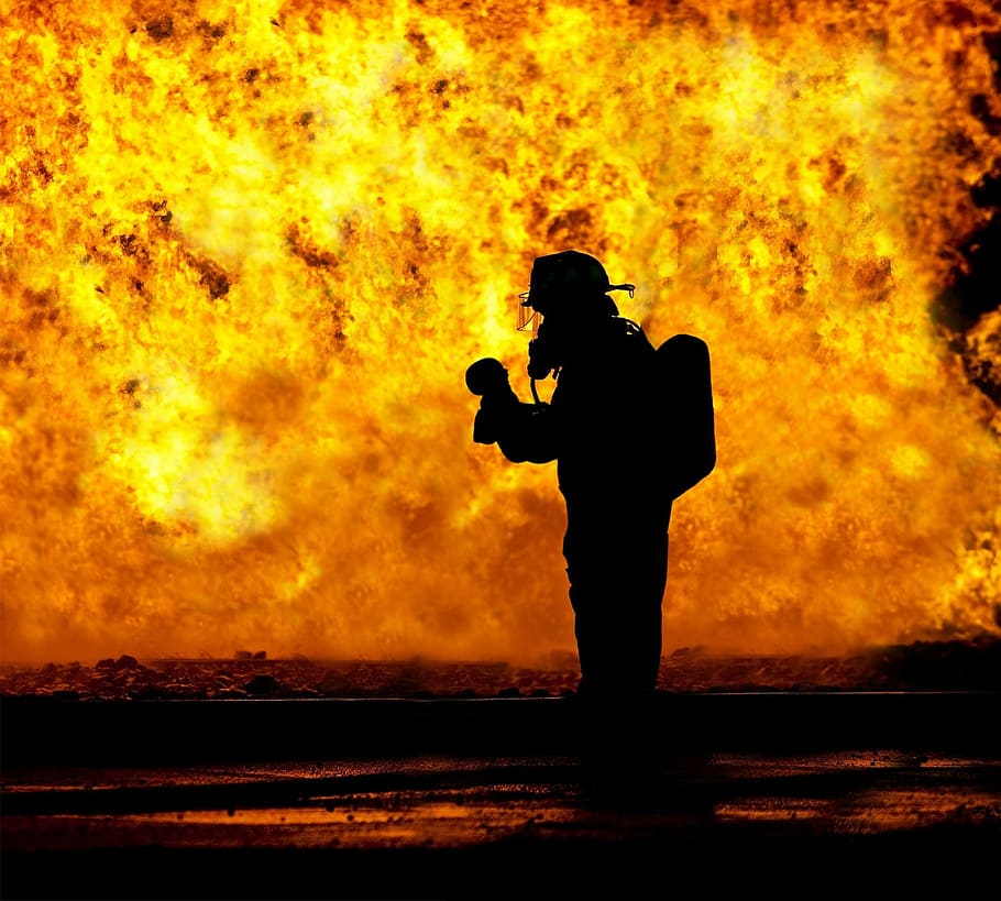 silhouette of man, fire fighter, rescue, baby, held, hard, fire, inferno, bad, pride