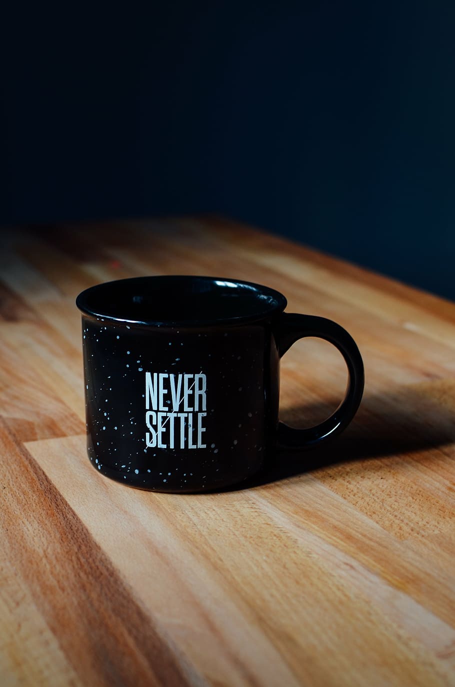black, never, settle, ceramic, mug, brown, wooden, table, quote, statement