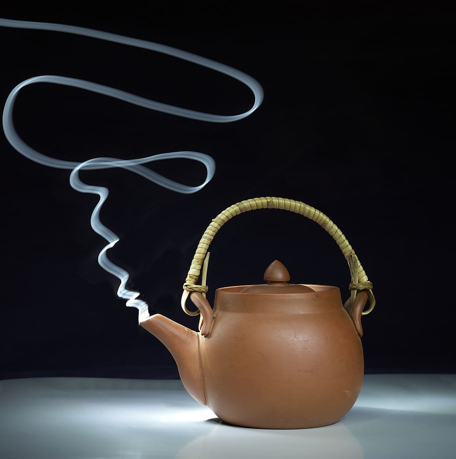 teapot, tea, painting with light, smoking, steam, indoors, studio shot, black background, close-up, still life