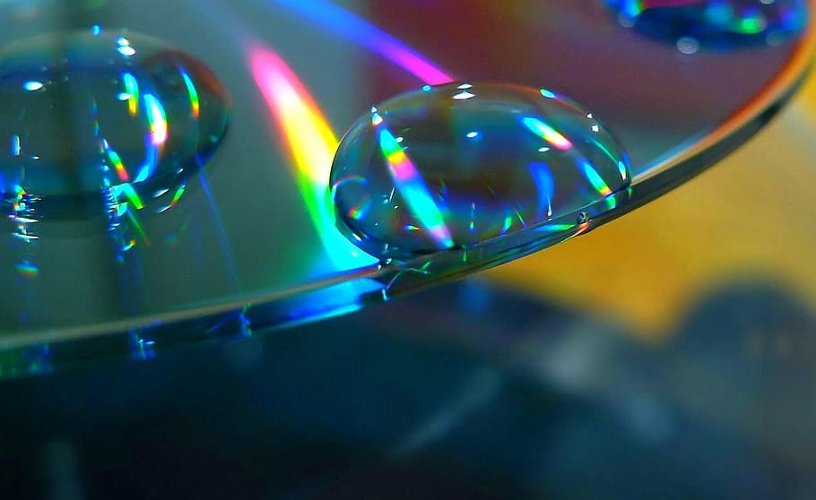 disc, cd, colorful, storage medium, reflection, blue, shimmer, sparkle, drop of water, run off