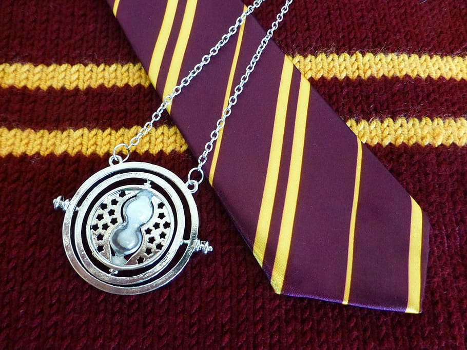 silver-colored pendant, necktie, harry potter, gryffindor, house colours, gold, maroon, red, school tie, scarf