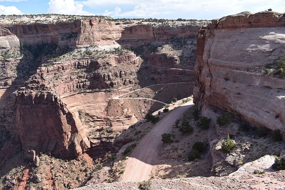 road, dirt, winding, landscape, path, scenic, sky, rocks, canyon, rock