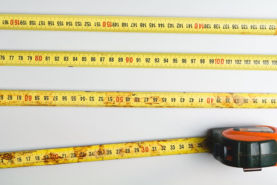 measuring tape, measurement, tools, construction, indoors, studio shot, wood - material, yellow, white background, tape measure
