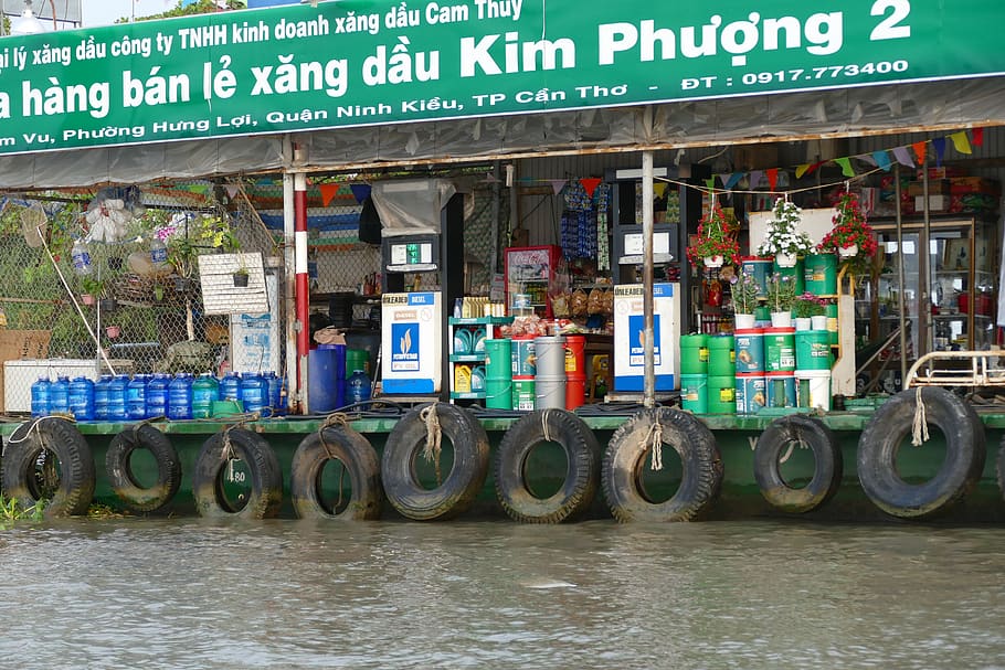 vietnã, rio mekong, rio, delta do mekong, transporte, viagem de barco, postos de gasolina, reabastecer, vasilha, lata tho