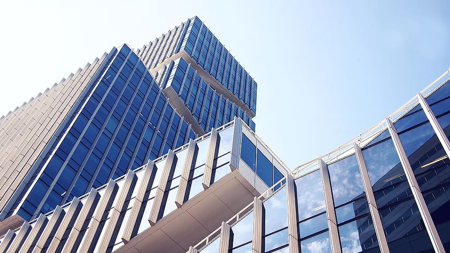 low-angle photo, high-rise, building, daytime, architecture, amsterdam, blue sky, business, modern, urban