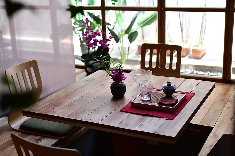 tables, chair, furniture, window, table, flower, flowering plant, seat, plant, wood - material