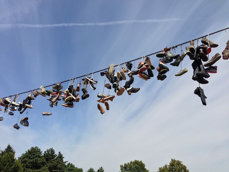 shoes, depend, leash, hang, shoelaces, sky, high above, art, nature, low angle view