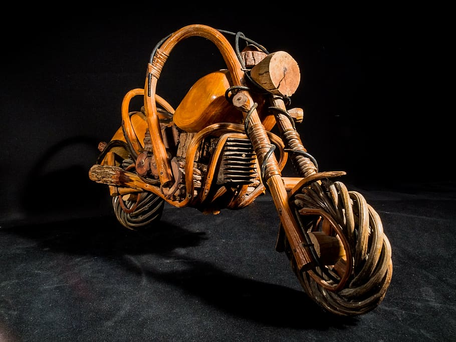 brown, wooden, cruiser motorcycle scale model, wooden motorcycle, wood model, art from thailand, equipment, black background, indoors, studio shot