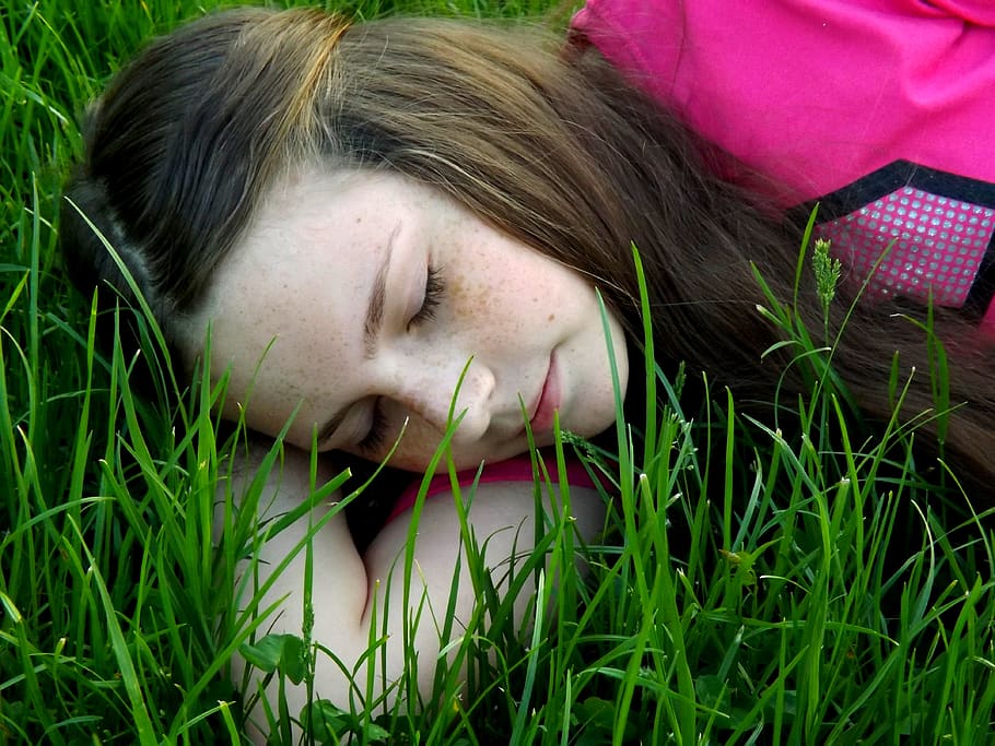 girl, freckles, asleep, grass, portrait, one person, headshot, lying down, young adult, women