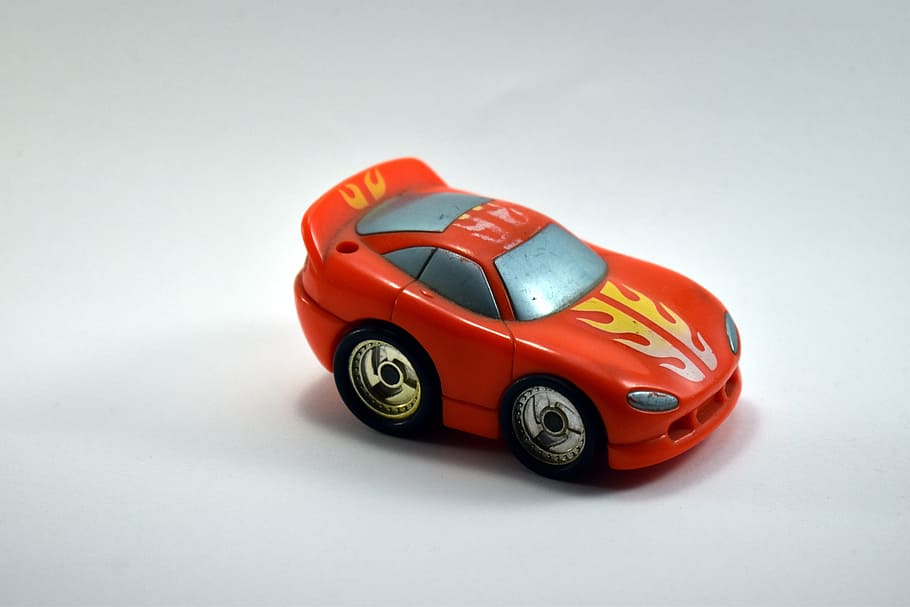 hotwheels car, toy, model car, plastic, studio shot, toy car, car, mode of transportation, indoors, motor vehicle