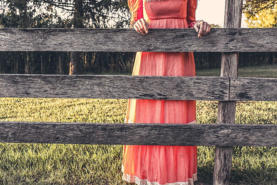 woman, leaning, gray, wooden, fence, red, dress, holding, brown, girl