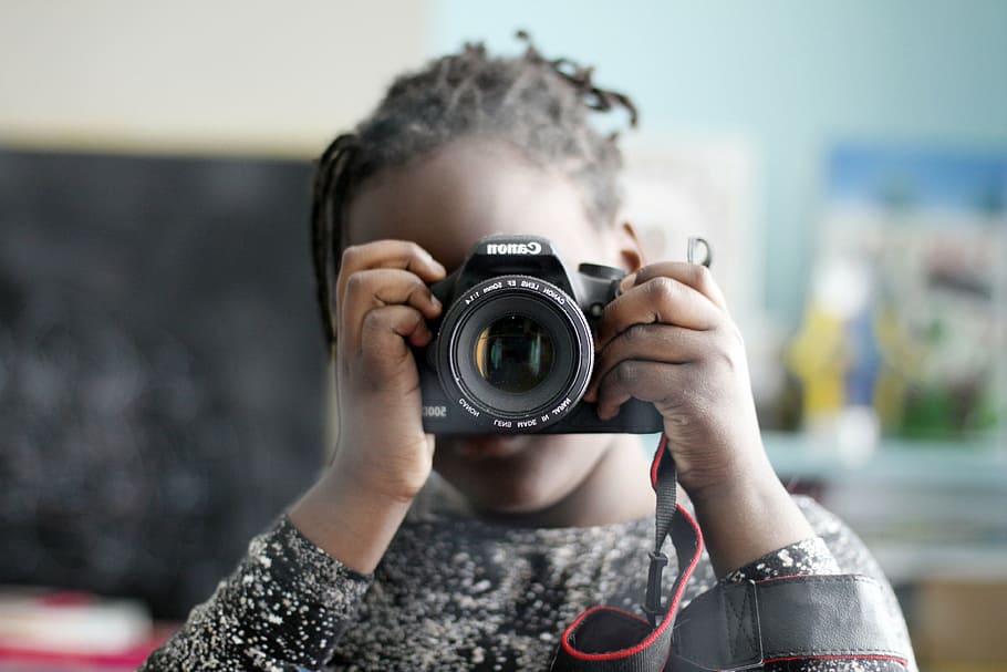 tilt shift lens photography, girl, holding, black, canon dslr camera, child, photographer, self-portrait, photography, black skin