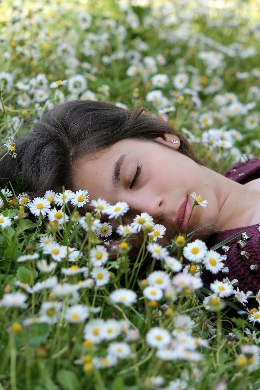 woman, wearing, maroon, shirt, lying, white, petaled flowers, sleep, rest, face