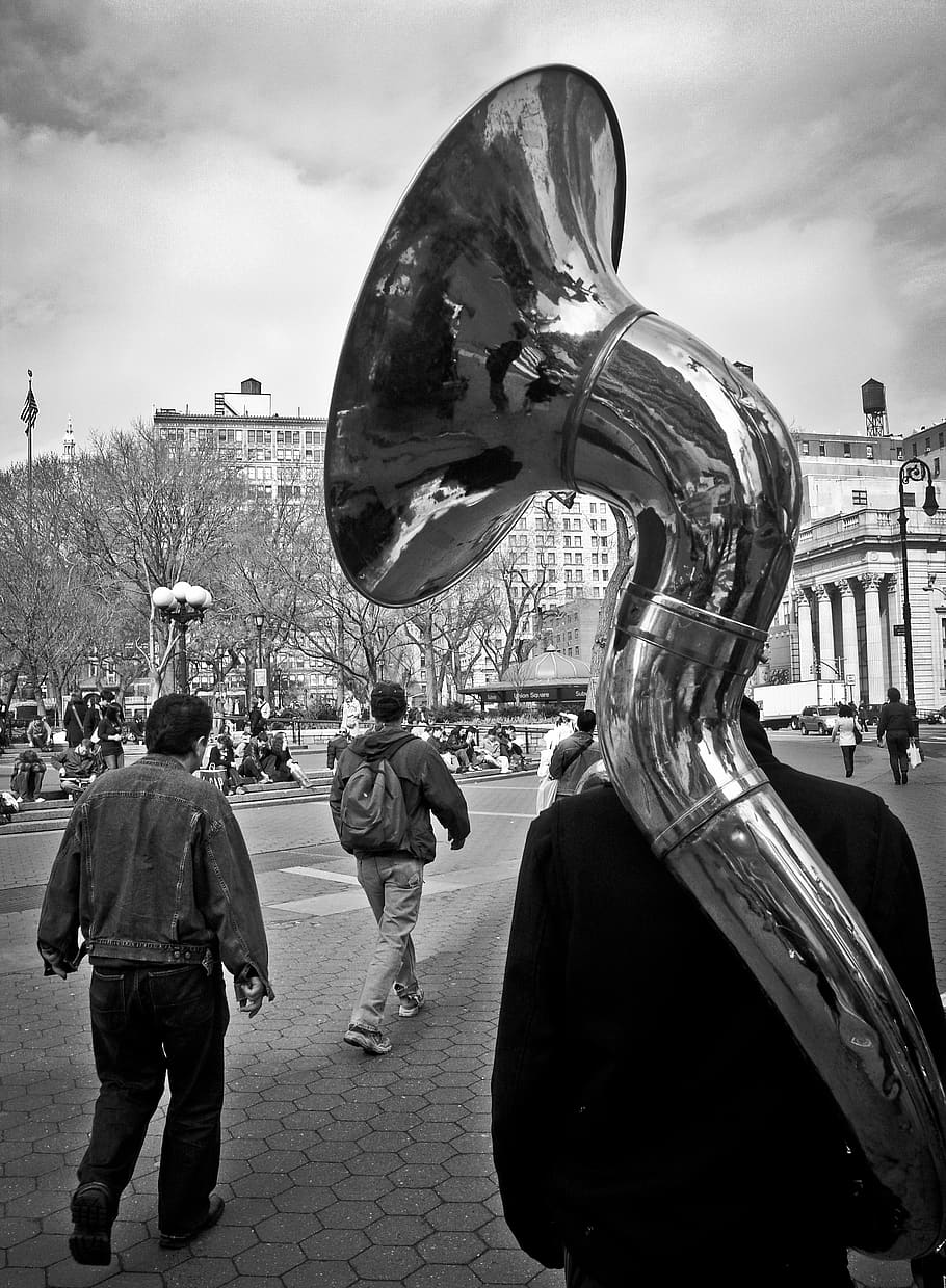 tuba, horn, instrument, music, band, cobblestone, pedestrians, walking, lamp posts, buildlings