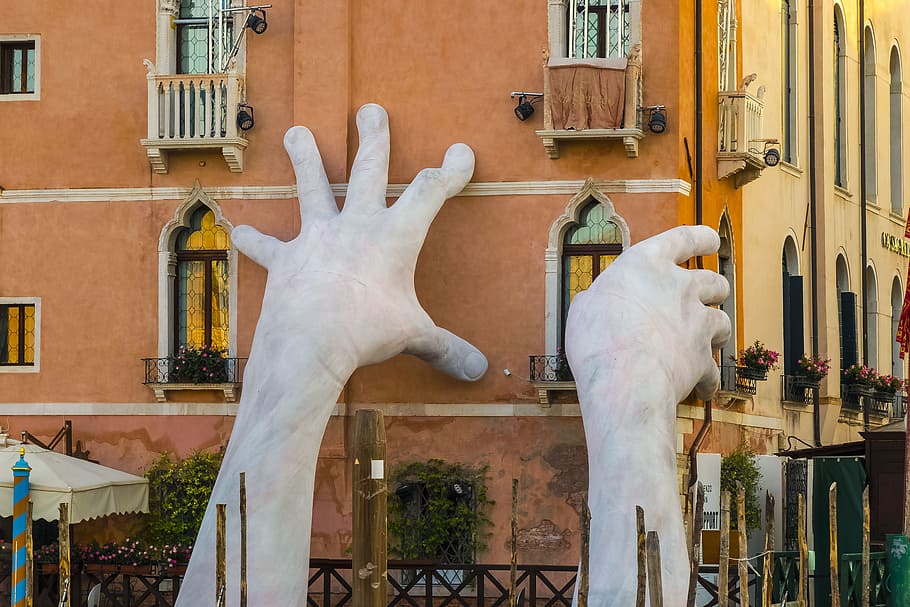 two, gray, stoned, hands statue, holding, brown, high-rise, building, venice, italy