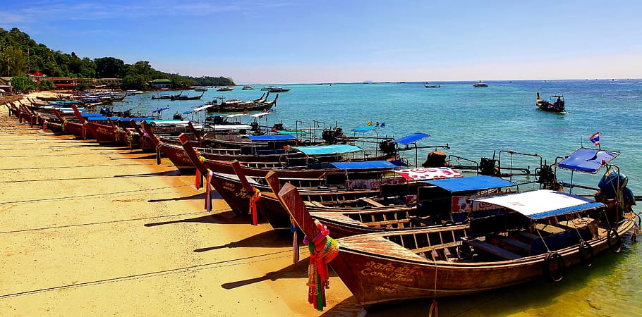 koh phi phi, botes de cola larga, tailandia, tours, pesca, viajes, taxi acuático, isla, islas tropicales, turismo