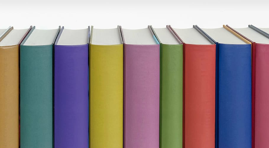 lote de livros de cores sortidas, livros, coluna, cores, pastel, capa dura, literatura, educação, conhecimento, estudo